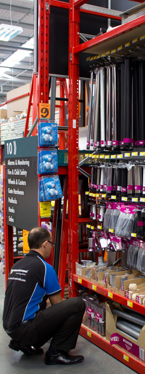 A Cornerstone Merchandising Solutions representative in a hardware store